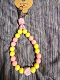 Pink and yellow beaded wristlet