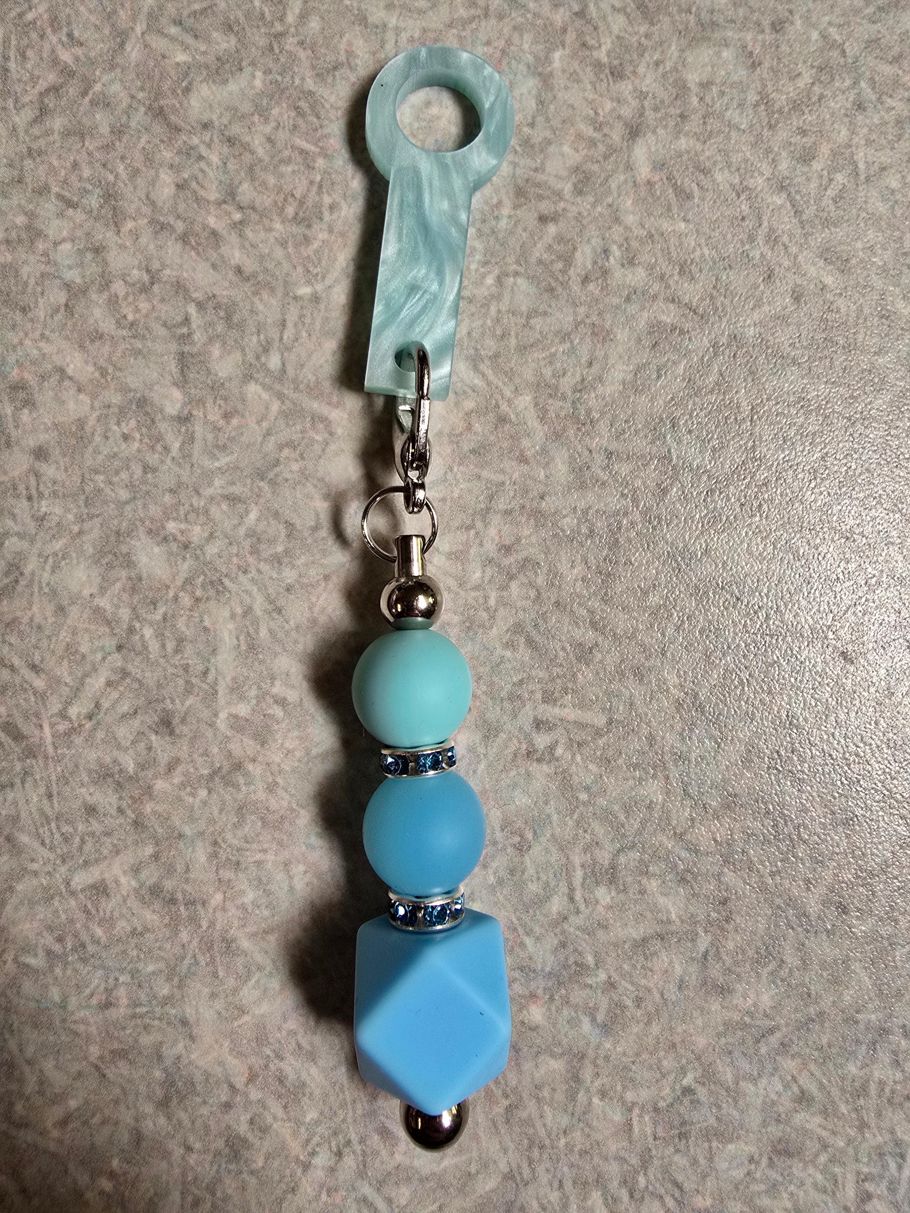 Blue beaded straw charm