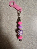 Pink and purple floral beaded straw charm