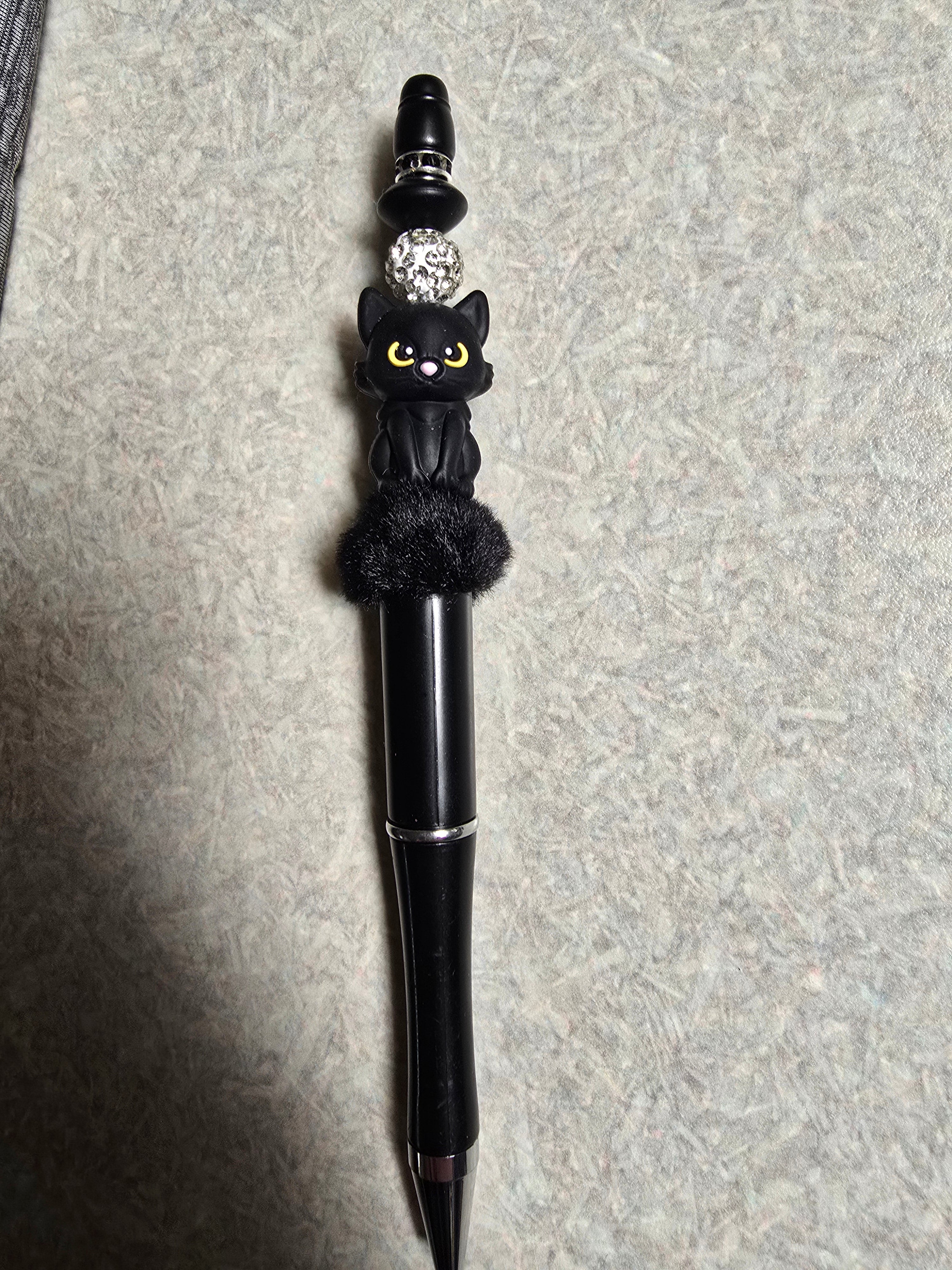 Black cat pen