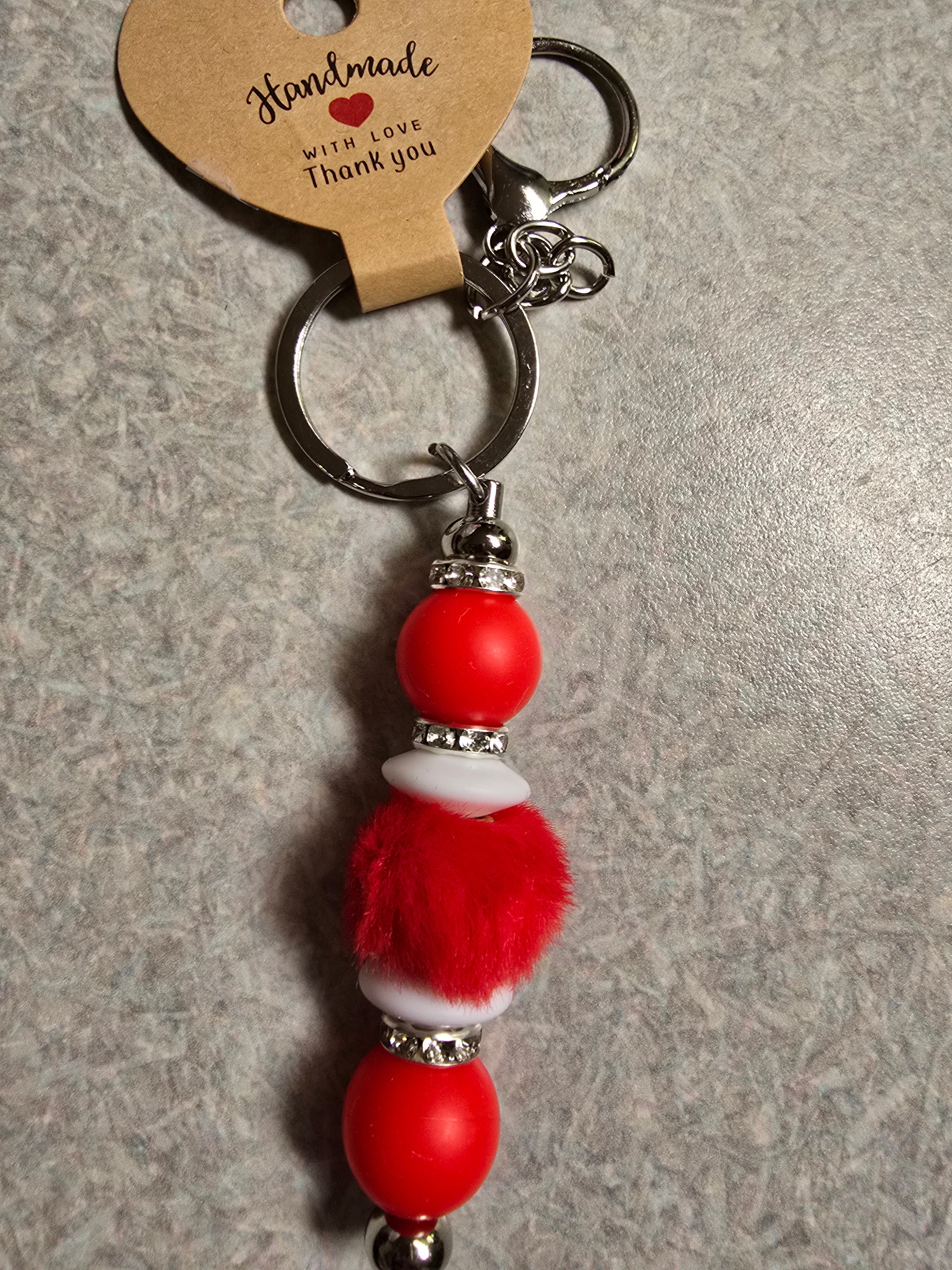 Red and white fuzzy keychain