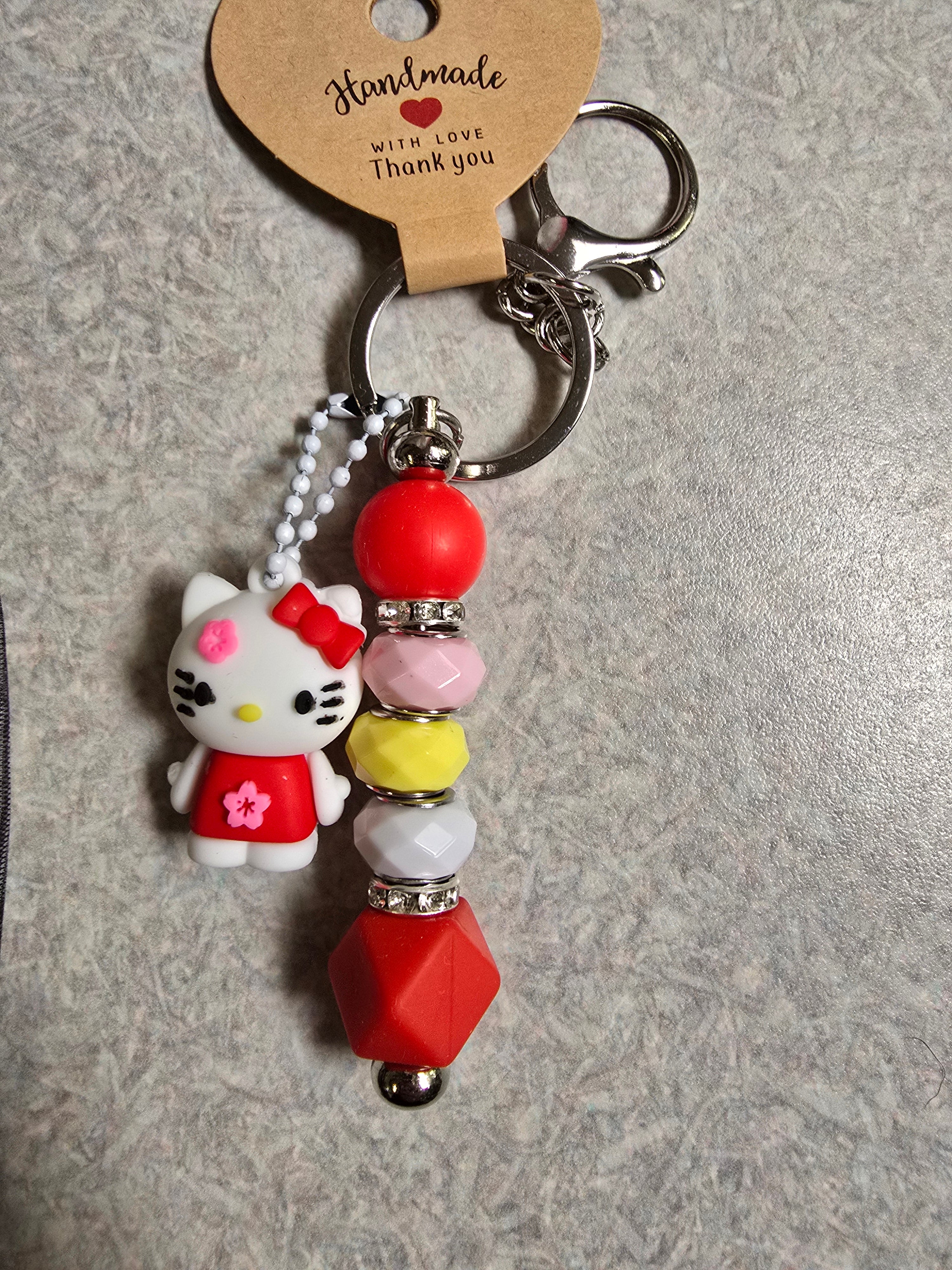 Hello kitty keychain and charm