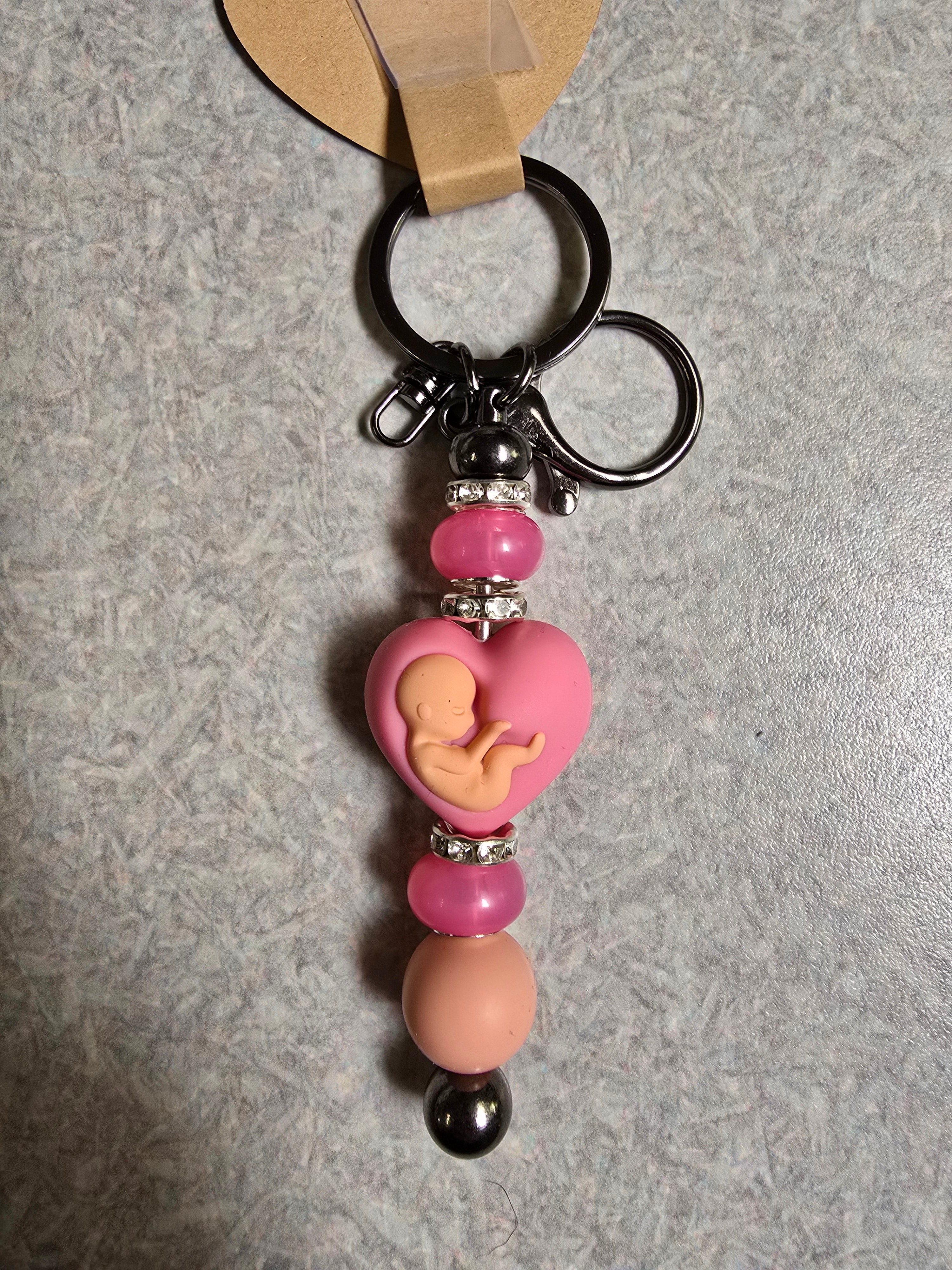 Baby in heart keychain
