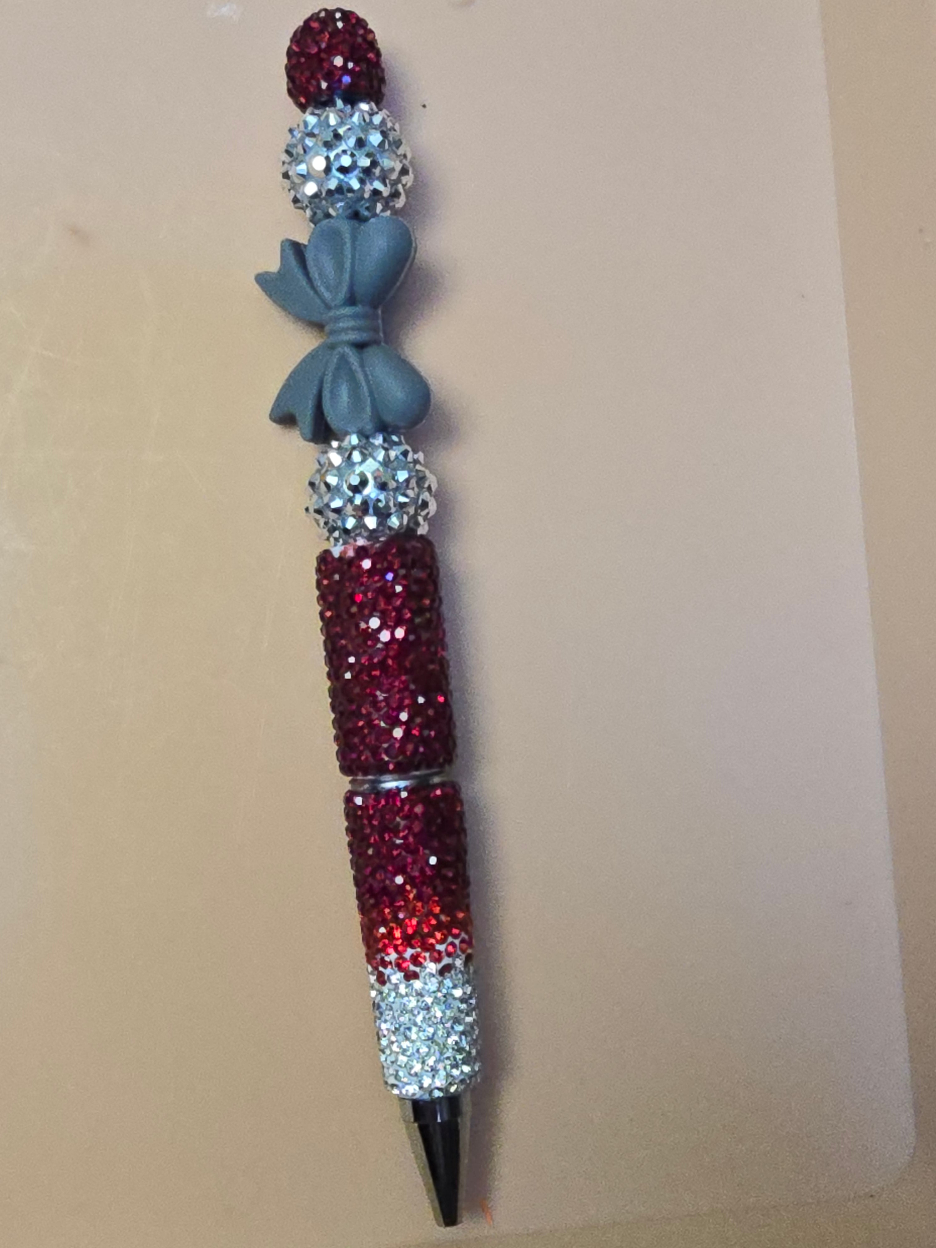 Red sparkle beaded pen