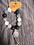 Black and white pawprint wrislet