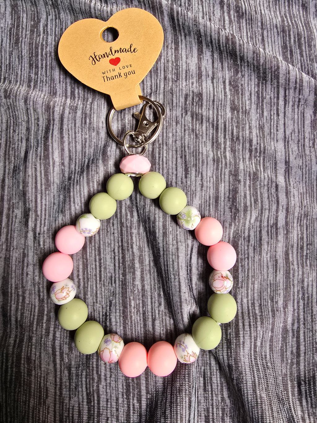 Pink and green beaded wrislet
