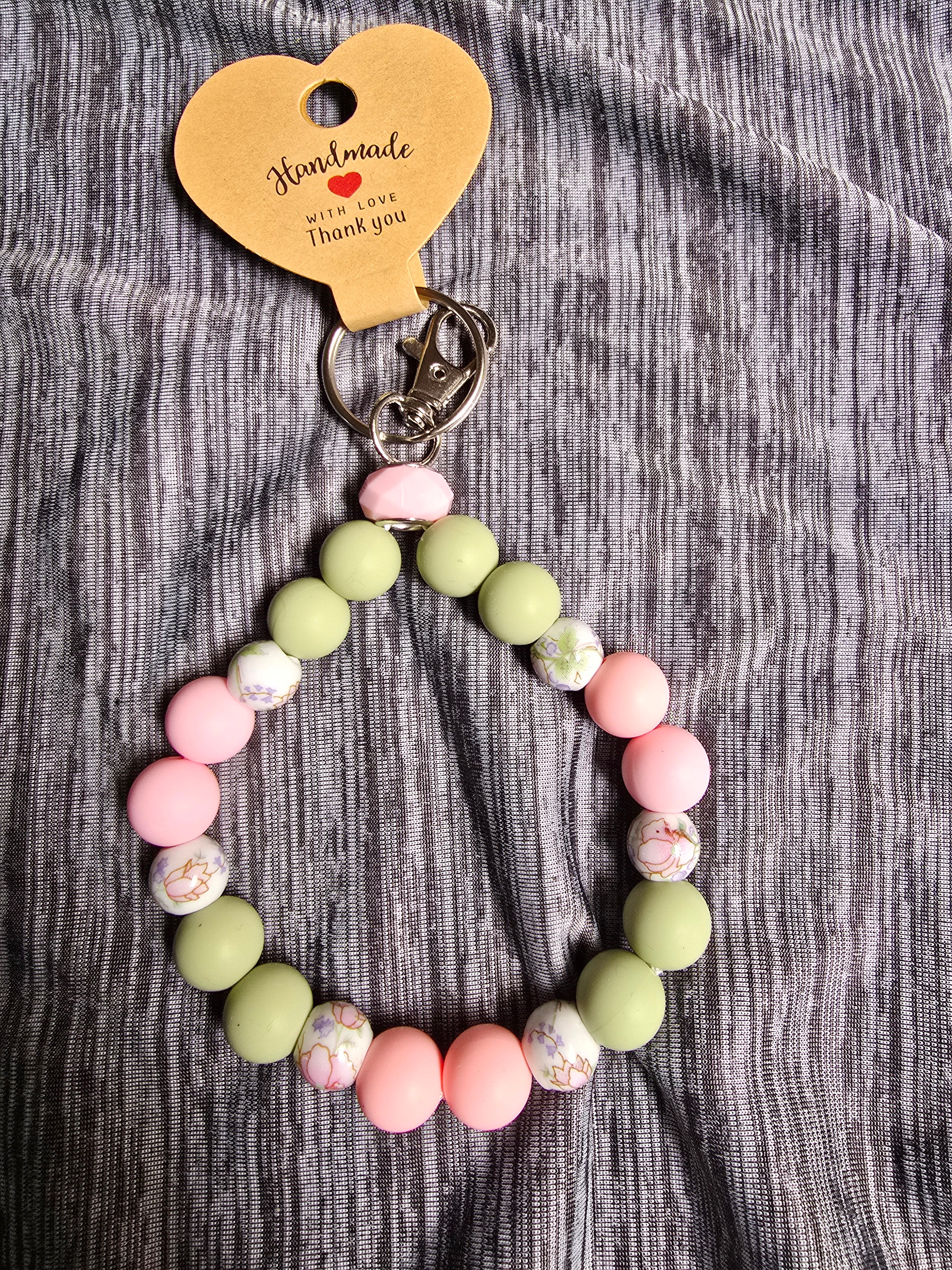 Pink and green beaded wrislet