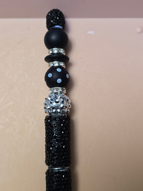Black and silver sparkle pen