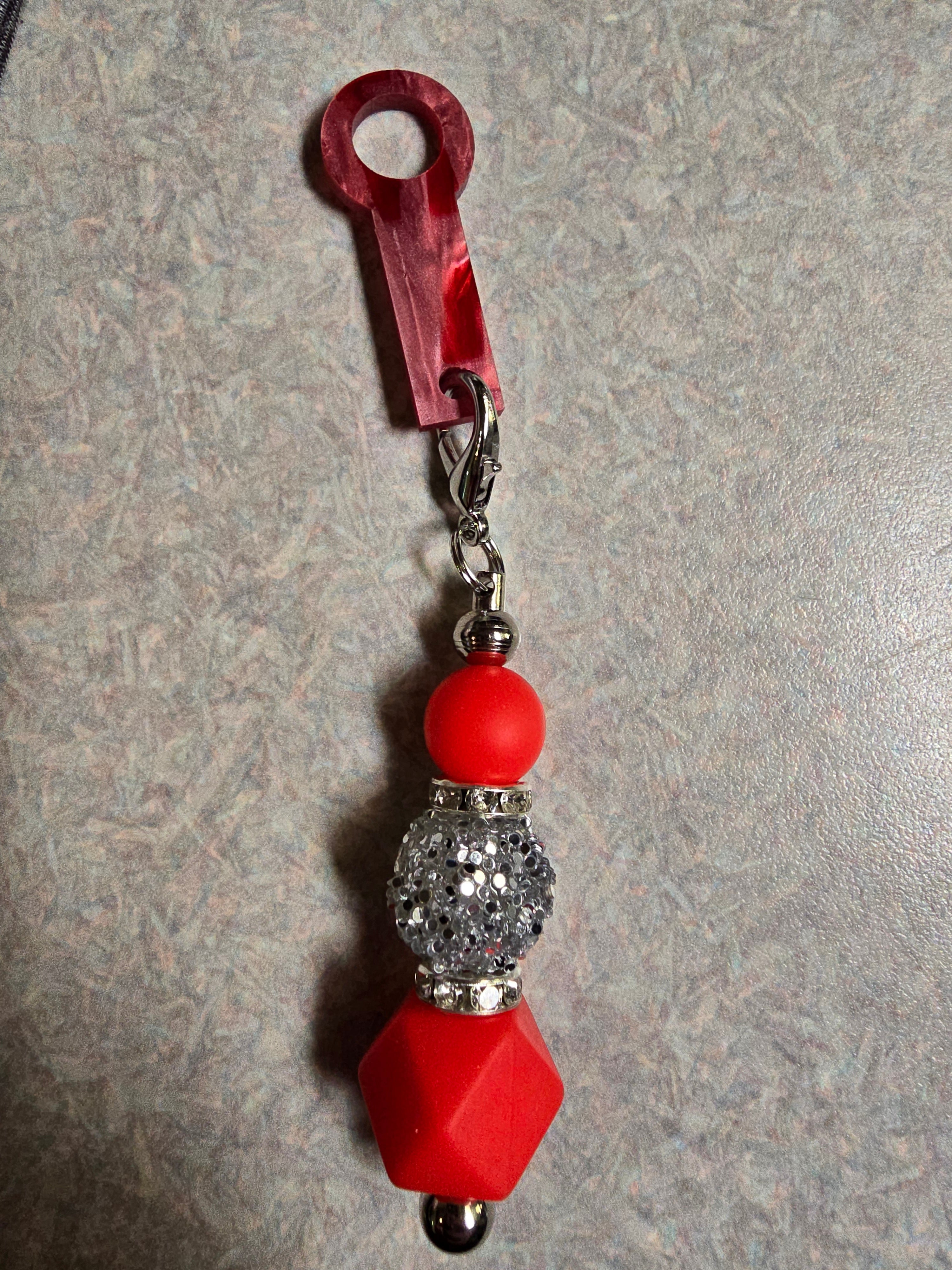 Red beaded straw charm