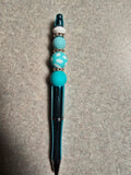 Blue beaded pen