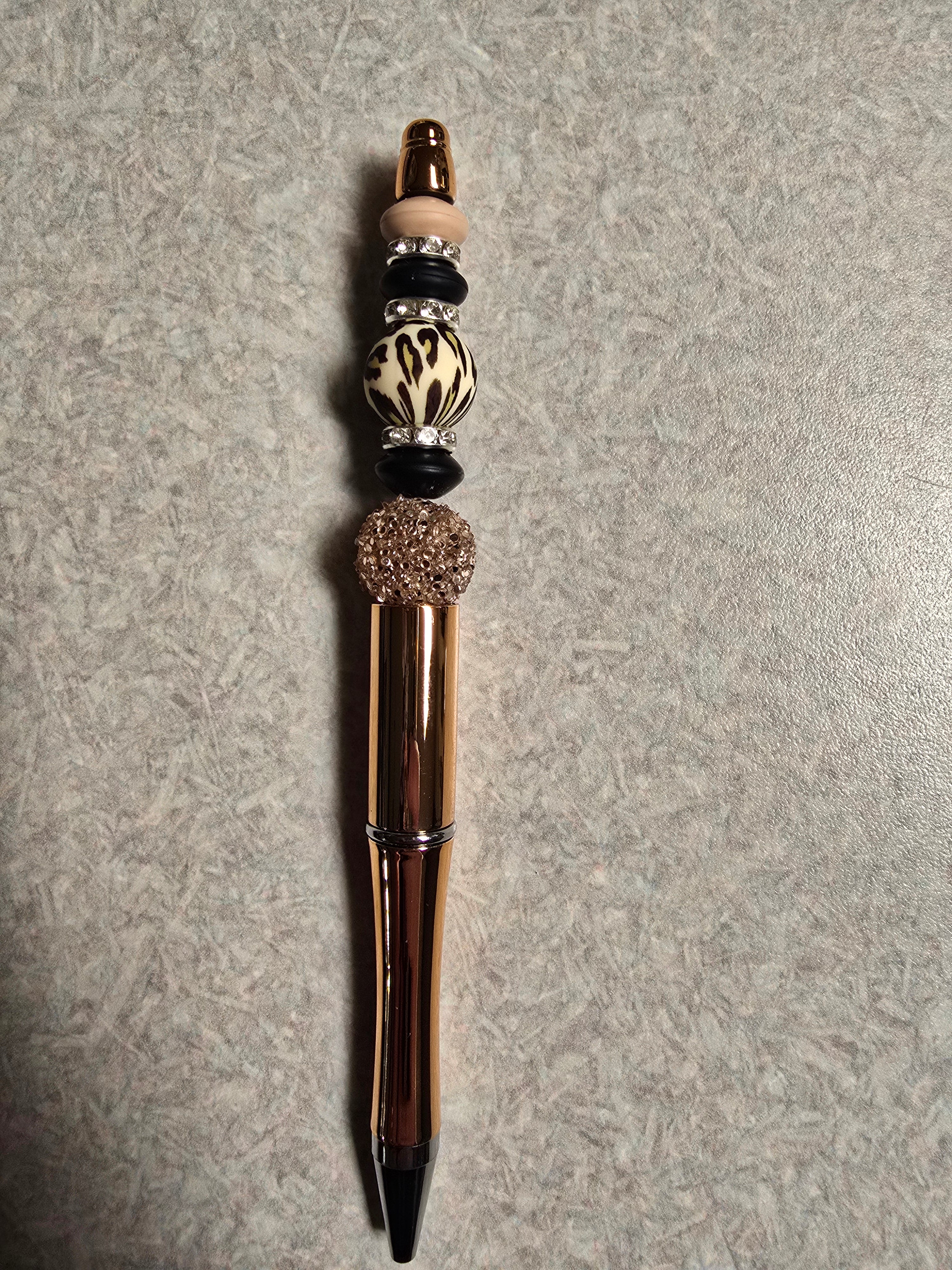 Gold cheetah print pen