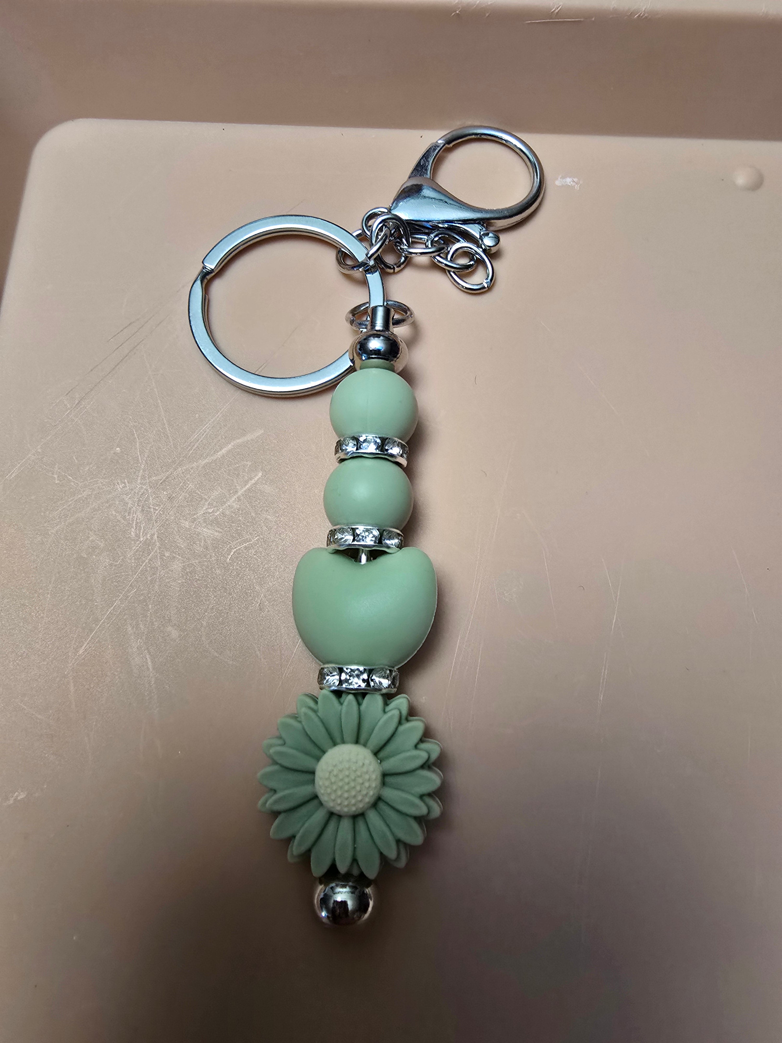 Green flower heart keychain